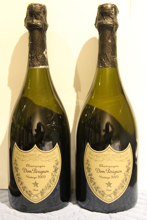 COLLECTION OF ESTATE WINE 2 BOTTLES DOM PERIGNON: A collection of Estate wine consisting of two bottles of Champagne Dom Perignon Vintage 2005.The consignor purchased the wine being offered from retailers and was the original owner. The wine was remo