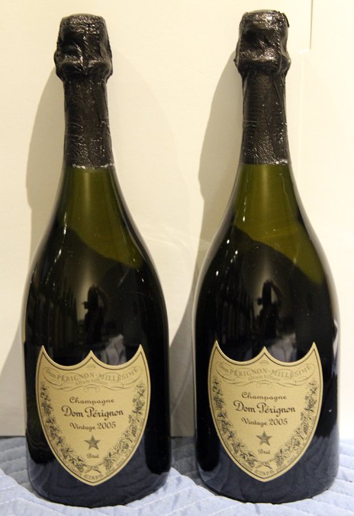 COLLECTION OF ESTATE WINE 2 BOTTLES DOM PERIGNON: A collection of Estate wine consisting of two bottles of Champagne Dom Perignon Vintage 2005.The consignor purchased the wine being offered from retailers and was the original owner. The wine was remo