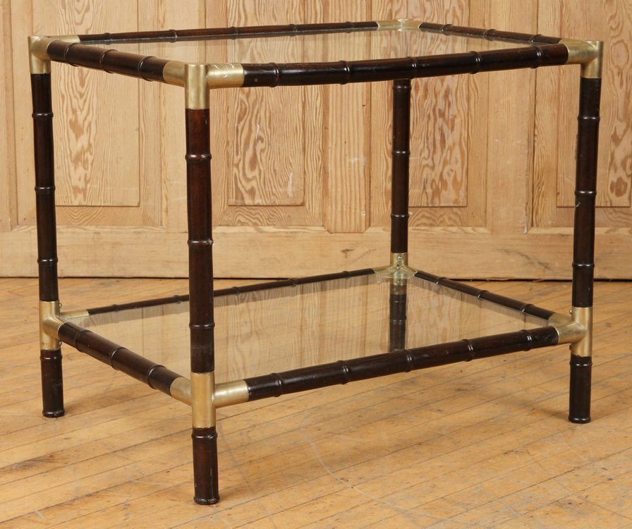FAUX BAMBOO OCCASIONAL TABLE MANNER BILLY HAINES: A faux bamboo and bronze mounted two tier occasional table in the manner of Billy Haines circa 1960. Ht: 23" Wd: 27" Dpth: 19.5"