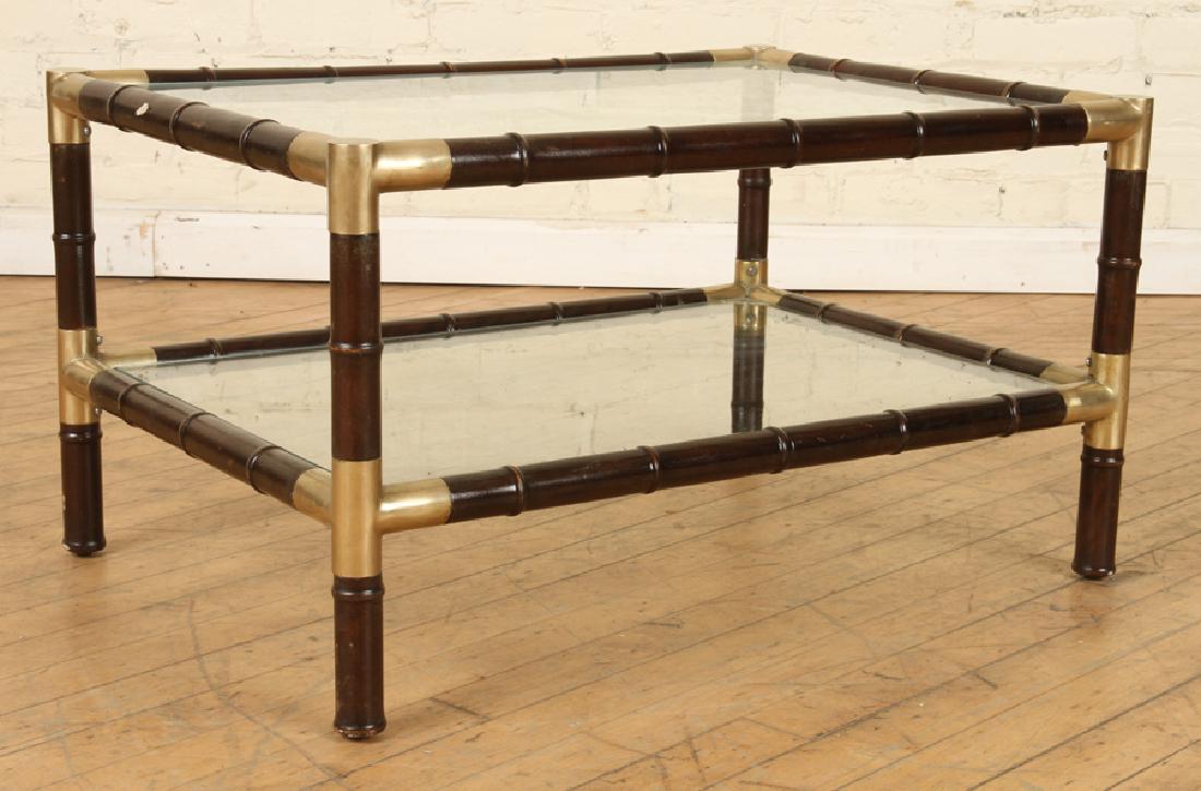 BRONZE GLASS COFFEE TABLE MANNER OF BILLY HAINES: A petite wood, bronze and glass coffee table in the manner of Billy Haines circa 1970. Ht: 15" Wd: 27" Dpth: 19.5"