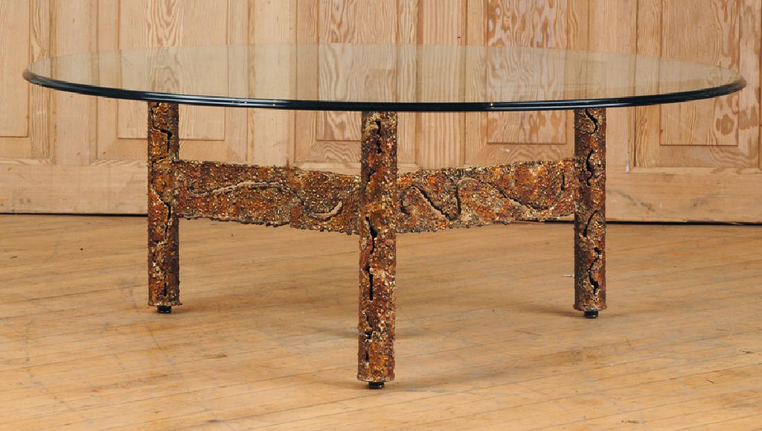 BRUTALIST STYLE IRON COFFEE TABLE GLASS TOP C1975: A Brutalist style iron coffee table with round glass top circa 1975. Ht: 16" Dia: 42"