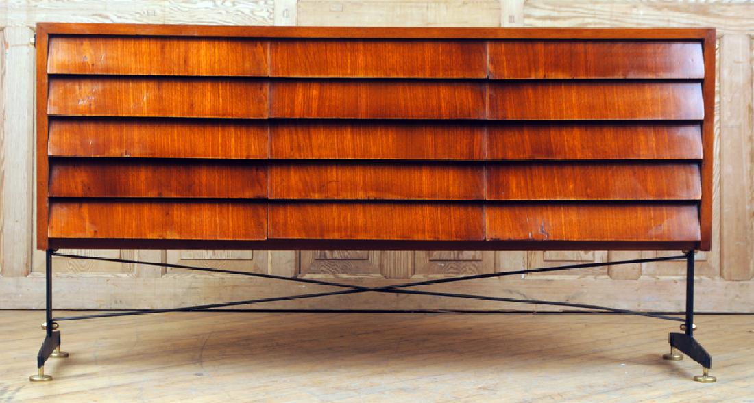 MID CENTURY MODERN DRESSER IRON BASE C.1960: An unusual fifteen drawer mid century modern dresser resting on an iron base with bronze details circa 1960. Ht: 31.5" Wd: 59" Dpth: 17.5"