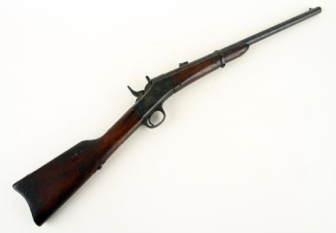 ANTIQUE REMINGTON ROLLING BLOCK RIFLE C.1867: An antique Remington rolling block ring carbine rifle believed to be .45-70 having FB stamped on barrel base circa 1867. 35.5"
