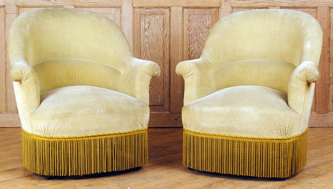 PAIR NAPOLEON III CLUB CHAIRS TURNED LEGS C.1870: A pair of Napoleon III club chairs resting on turned legs circa 1870. Ht: 32" Wd: 30" Dpth: 27" Seat: 15"