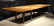 NORBERT KIMMEL DINING TABLE CHERRY WALNUT TOP