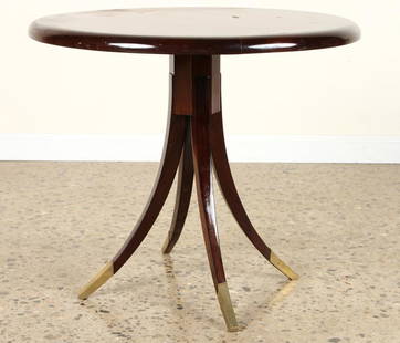 MAHOGANY BRONZE TABLE BY MAURICE JALLOT C.1925: An elegant mahogany and bronze occasional table by Maurice Jallot circa 1925. Having a radiating mahogany top resting on splayed legs. Ht: 20" Dia: 24"