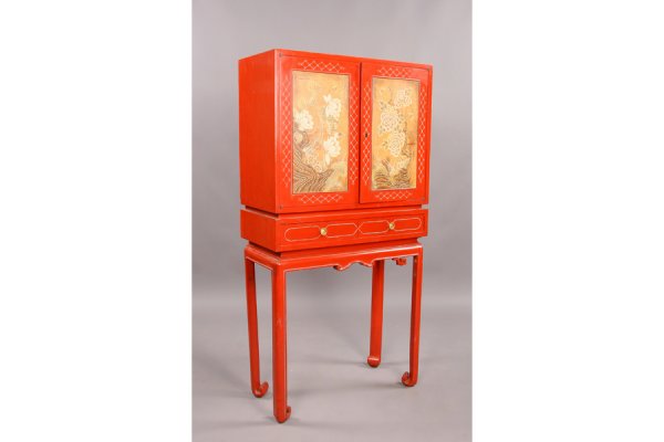Mod chinoiserie David Hicks style 2door cabinet: Very cool mid century modern Chinese Chippendale standing cabinet. With highly stylized lotus and peony floral designed doors bordered by incised string design. All over two drawers and base with fret
