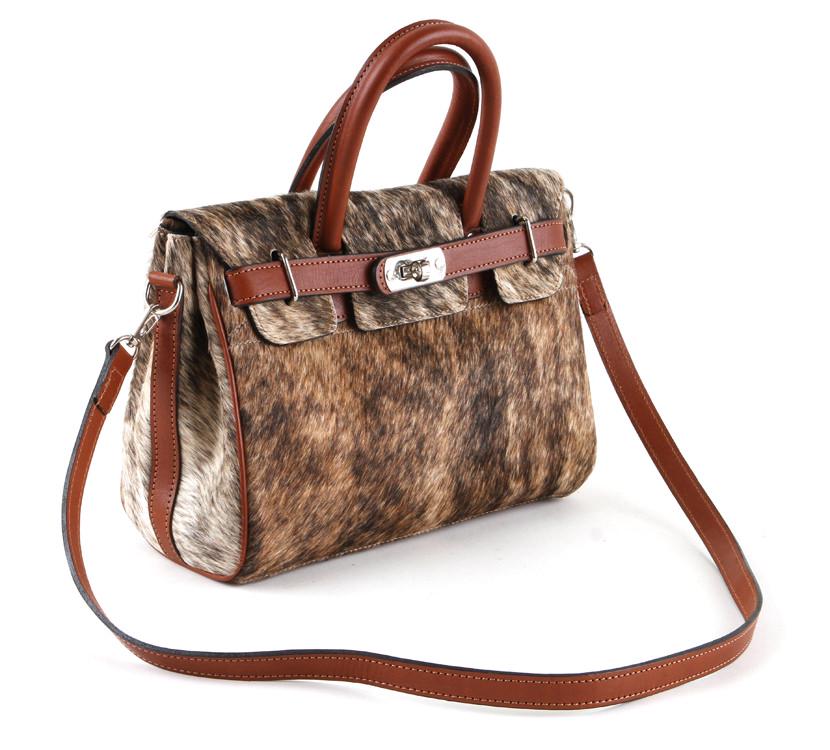 CONTEMPORARY HIDE AND LEATHER WOMENS HANDBAG: A contemporary hide and leather women's handbag. 12.5"