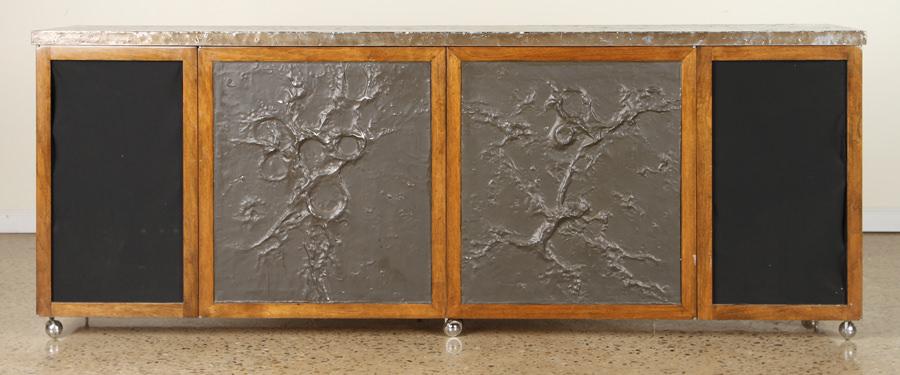 CREDENZA WITH PATINATED METAL TOP & DOOR PANELS: A credenza with patinated metal top and door panels. Ht: 32" Wd: 84.75" Dpth: 17.75"