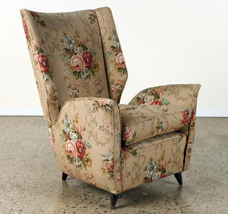 GIO PONTI ITALIAN CLUB CHAIR FLARED BACK C.1950: A mid century modern Gio Ponti Italian club chair having floating and flared back and raised on tapered wood legs circa 1950. Ht: 38" Wd: 26" Dpth: 33" Seat: 18"