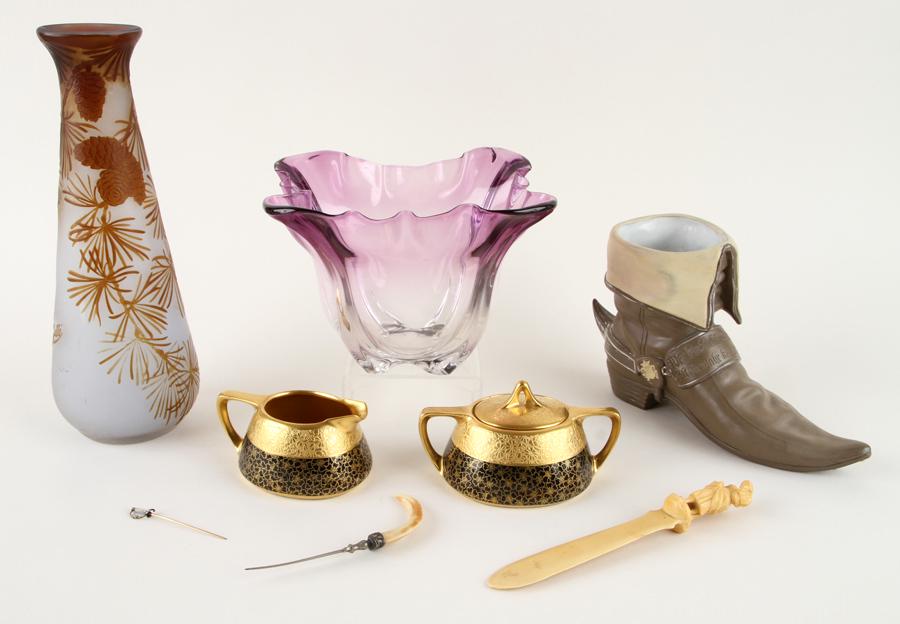 A LOT OF SEVEN ASSORTED DECORATIVE ITEMS: A lot of seven assorted decorative items. To include: A Steuben clear and amethyst bowl A German stoneware boot A Pickard sugar and creamer A faux ivory letter opener A letter opener with tooth A mini