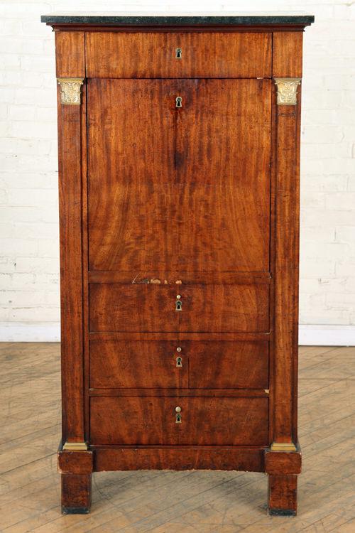 19TH C. MARBLE TOP FRENCH MAHOGANY SECRETARY: A nineteenth century marble top and bronze mounted French mahogany secretary abattant having four drawers and drop down door. The door opens to reveal an open compartment with arch top and capitals an