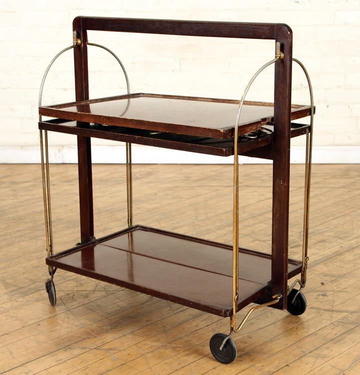 UNUSUAL COLLAPSIBLE BAR CART CIRCA 1960: An unusual collapsible bar cart circa 1960. Ht: 31" Wd: 27" Dpth: 16"