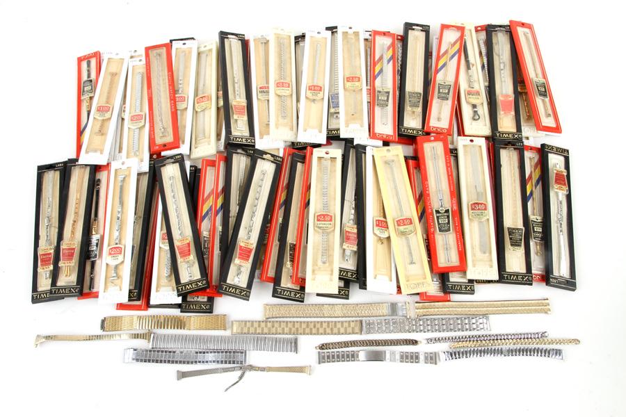 COLLECTION OF 99 VINTAGE WATCH BANDS TIMEX BRITE: A collection of ninety one vintage watch bands including Timex, Brite and Topps circa 1960. Seventy seven bands are in original packing.