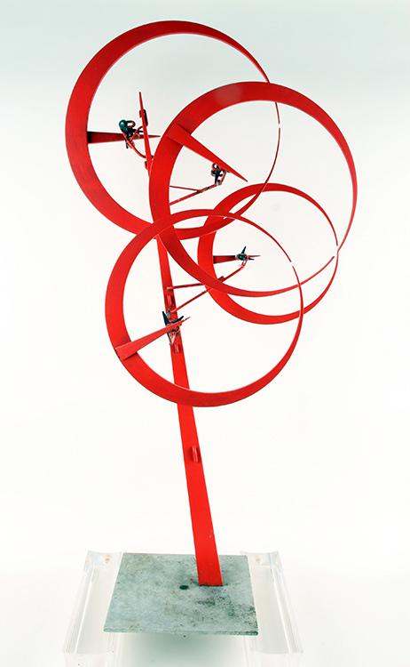 JEROME KIRK "FOUR RED RINGS" KINETIC SCULPTURE: Jerome Kirk (American, b. 1923) "Four Red Rings" kinetic sculpture, dated July 1978 and accompanied by a hand signed book. Ht: 46.5" Wd: 24" Dpth: 12"