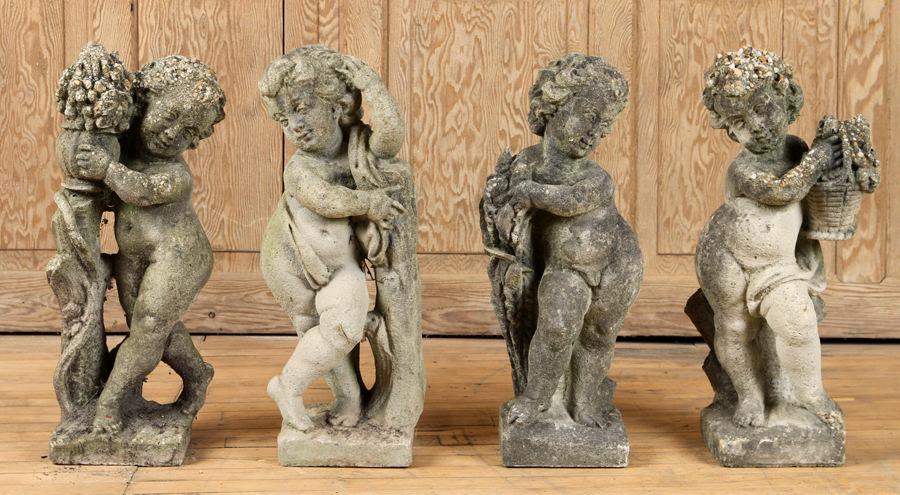 SET OF 4 VINTAGE CAST STONE GARDEN FIGURES: A set of four vintage cast stone four season garden figures. Ht: 24" Wd: 11" Dpth: 10.5"