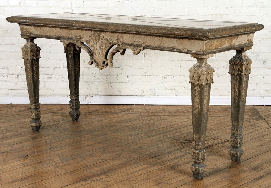 LOUIS XVI STYLE STONE CONSOLE TABLE GRANITE TOP: A Louis XVI style console table crafted of formed stone with granite top. Ht: 36.5" Wd: 72" Dpth: 24"