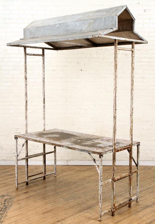 IRON AND TIN POTTING TABLE WITH ROOF CIRCA 1920: An iron and tin potting table with roof circa 1920. Ht: 92" Width: 62" Depth: 36"