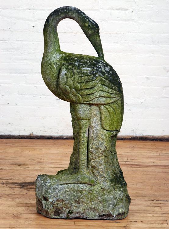 CARVED GRANITE SWAN GARDEN STATUE: A carved granite garden statue of standing swan on naturalistic base. Ht: 36" Wd: 12" Dpth: 18"