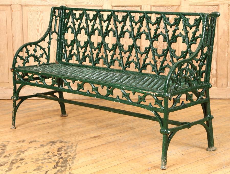 CAST IRON GOTHIC BENCH QUATREFOIL DECORATION: A painted cast iron Gothic style bench having quatrefoil decoration. Ht: 34" Wd: 55" Dpth: 20" Seat: 17"