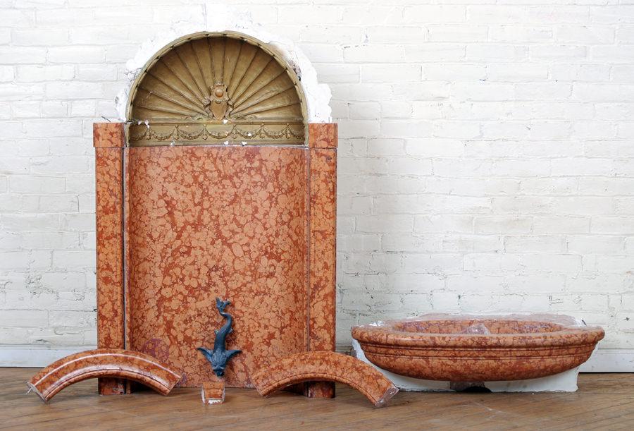 MARBLE PLASTER WALL FOUNTAIN FROM FOX THEATRE: A multi piece marble and plaster wall fountain from the Fox Theatre having a lead dolphin circa 1910. Ht: 62" Wd: 34" Dpth: 18"
