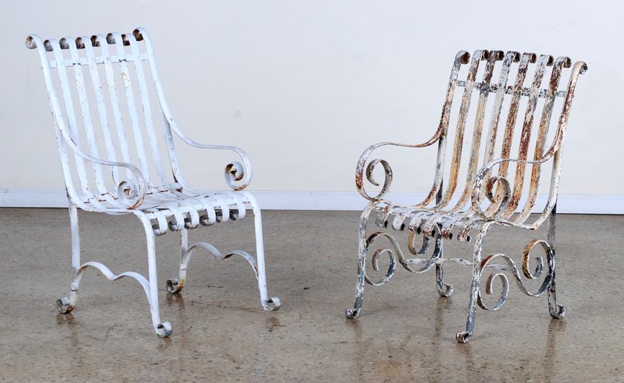 PAIR ADAMS FOUNDRY PHILADELPHIA IRON CHAIRS: A similar pair of labeled Adams Foundry, Philadelphia iron garden arm chairs having overall scroll design. Ht: 37.5" Wd: 20.75" Dpth: 24"