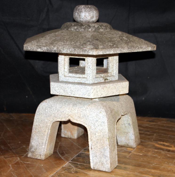 CARVED GRANITE GARDEN PAGODA: A carved granite garden pagoda. Ht: 25" Dia: 26"