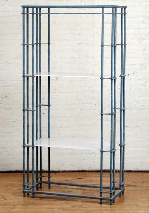 LARGE IRON COLUMN FORM ETEGERE MILK GLASS SHELVES: A large iron column form etegere having milk glass shelves. Ht: 74" Wd: 36" Dpth: 18"