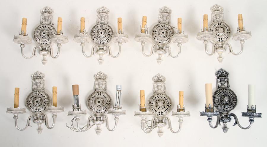 SET OF 8 2-ARM SILVER PLATE WALL SCONCES: A set of eight two arm silver plate wall sconces. One marked "Lion Elec" Ht: 13" Wd: 11" Dpth: 5"