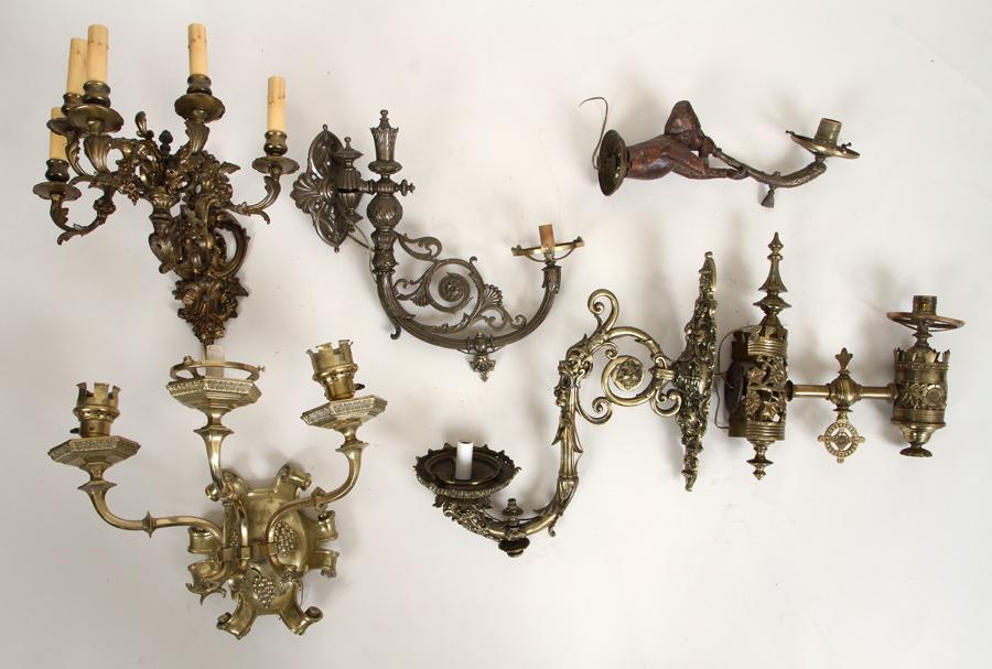 SIX VICTORIAN SINGLE BRONZE SCONCES: A lot of six Victorian single bronze sconces including Aesthetic Movement, figural, five arm, three arm and two gas single arm sconces. Ht: 14" Wd: 18" (three arm)