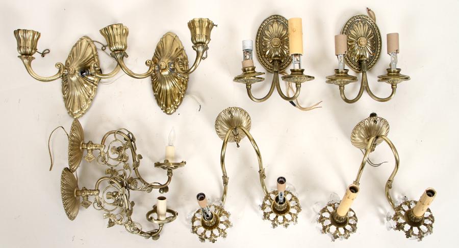 4 PAIRS OF BRASS WALL SCONCES C. 1910: Four pairs of brass wall sconces circa 1910. Ht: 8.5" Wd: 11.5" (widest pair)