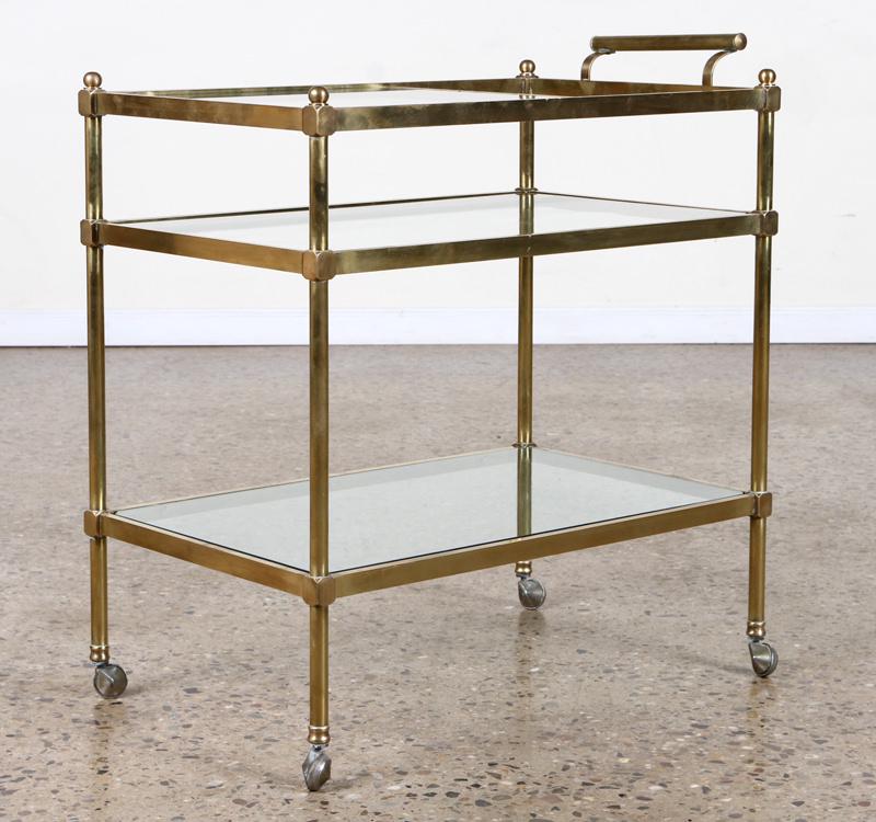 BRONZE & GLASS 3 TIER DRINKS CART C. 1960: A mid century modern bronze and glass three tier drinks cart circa 1960. Ht: 34.5" Wd: 29" Dpth: 17.75"