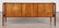 PARCHMENT COVERED SIDEBOARD FLOATING CABINET