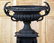 LARGE CAST IRON GARDEN URN WITH FOLIATE HANDLES - 2