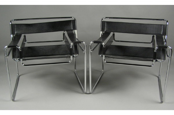 PAIR OF WASSILY CHROME AND LEATHER CHAIRS.