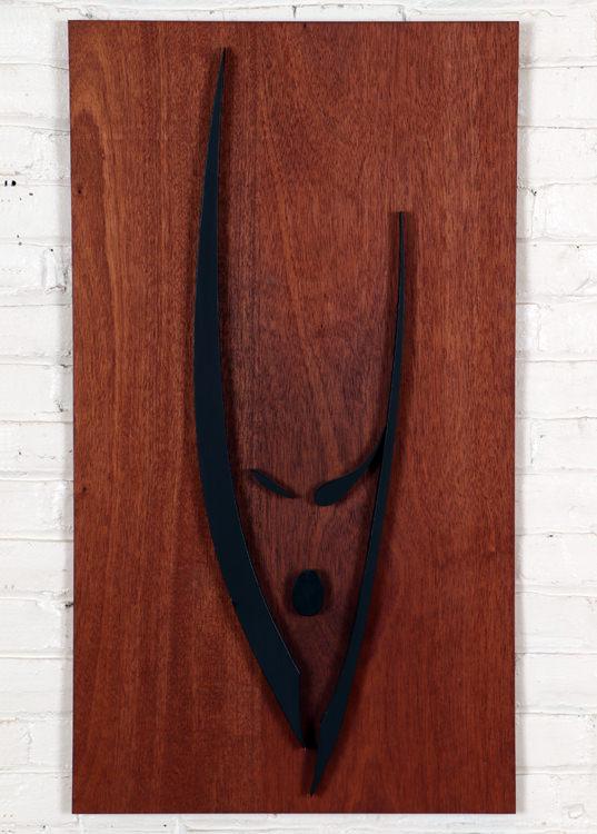 DON KESSLER MAHOGANY PLAQUE DEPICTING FISH C 1960: Don Kessler (American, 20th Century) A mid century modern mahogany plaque with carved ebonized wood depicting a fish circa 1960. Ht: 36" Wd: 20"