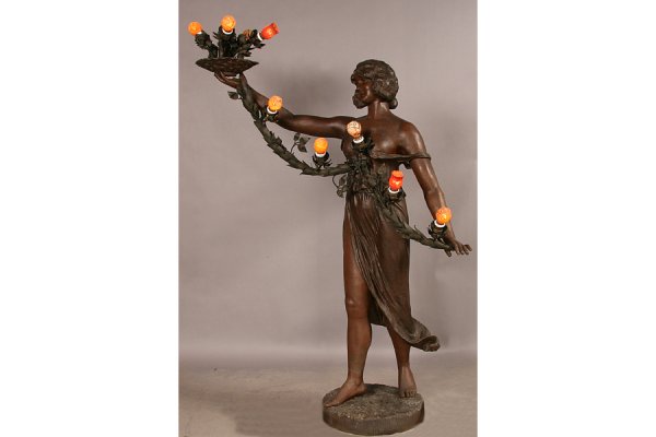 5 ft Victorian zinc figural newel post light lady: A five foot antique Victorian zinc figural newel post light of a classically draped female circa 1880. Her arm raised holding a basket of flowers, with a downswept floral garland connecting to her oth