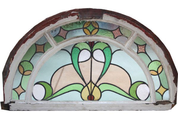 GROUP OF 4 ARCHED TOP STAINED GLASS TRANSOMES: Group of four arched top stained glass transomes with multi-colored and textured panels circa 1920. Largest: Ht: 27 Width: 46" Depth: 2" ***PLEASE NOTE: All property shall be paid for by the purchaser