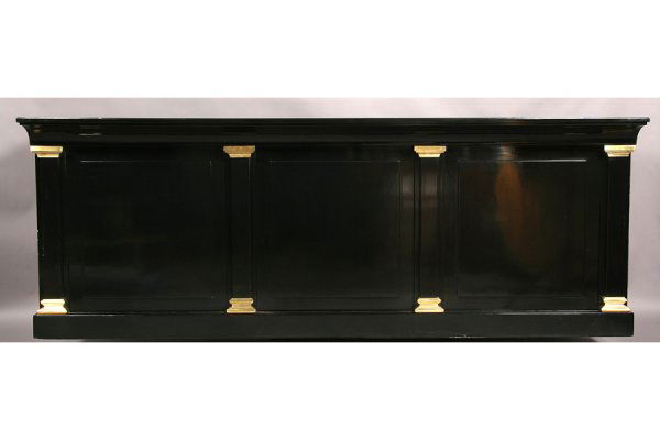 EBONIZED JANSEN DISPLAY CASE ARBUS BRASS TRIMMED: Very good ebonized Jansen bar counter in the manner of Andre Arbus with detachable bronze top resting on a base with sixteen drawers circa 1950. Bronze mounted pilasters framing raised panels. Ht: 41.