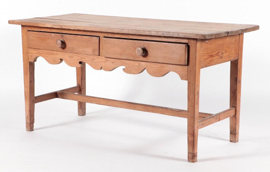 19TH CENTURY PINE TWO DRAWER WORK TABLE: A nineteenth century pine two drawer work table. Ht: 30.25" Wd: 60" Dpth: 27.75"