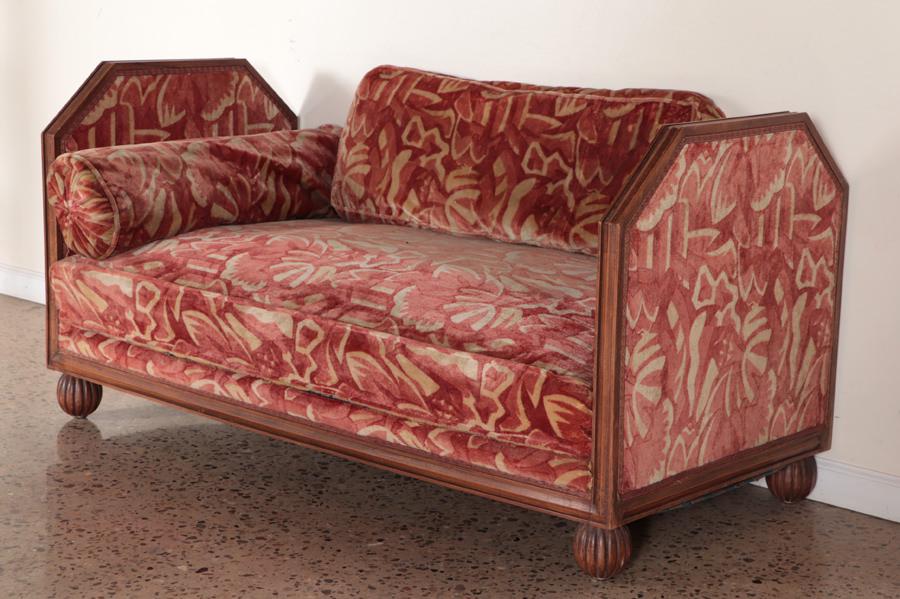 FRENCH ART DECO DAY BED PERIOD FABRIC 2 PILLOWS: A French Art Deco day bed in period fabric with two pillows and one hinged end that drops down to increase sleep area. Ht: 30" Wd: 58.75" Dpth: 30"