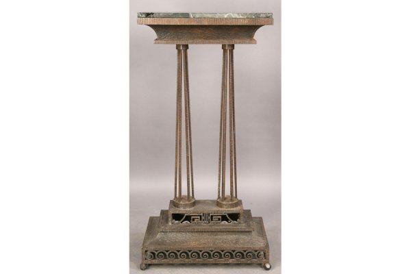 ANTIQUE ART DECO FRENCH IRON MARBLE PEDESTAL: Good Art Deco French Fer Forge pedestal with marble top over a stepped and fluted frieze on two columns and a stepped base circa 1920. Ht: 47.5" Width: 23.5" Depth: 15" ***PLEASE NOTE: All property s