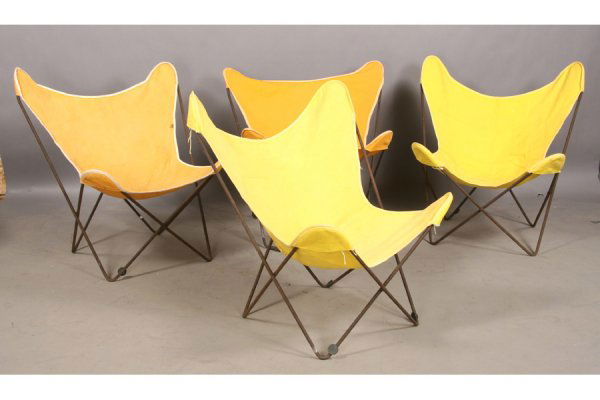 SET KNOLL VINTAGE IRON BUTTERFLY CHAIRS CANVAS: A set of Knoll vintage iron butterfly chairs with canvas seats circa 1960. Ht: 33" Width: 30.5" Depth: 28" ***PLEASE NOTE: All property shall be paid for by the purchaser within five (5) business day