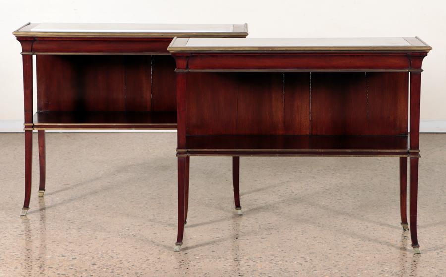 PAIR MAHOGANY MARBLE TOP CONSOLES BY JANSEN 1940: An unusual pair of mahogany and bronze mounted console tables with marble tops by Jansen circa 1940. Having an overall restrained design. Ht: 34.5" Wd: 42.75" Dpth: 15.75"