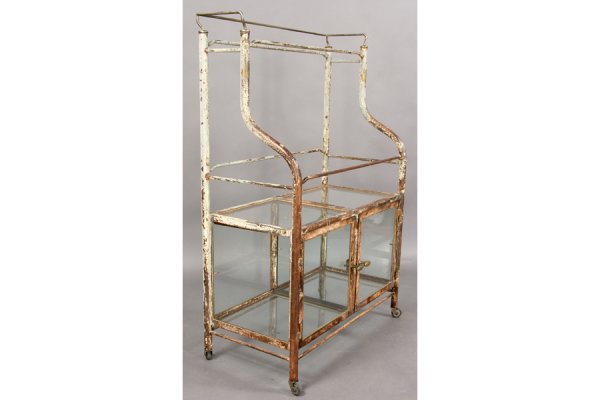 IRON AND GLASS STORE FIXTURE LABELED PARIS: Iron and glass store fixture having two doors labeled "Down Bros. St Thomas Street Grand Prix Paris 1900. London SE Patent No". Ht: 55" Width: 36" Depth: 17" ***PLEASE NOTE: All property shall be paid