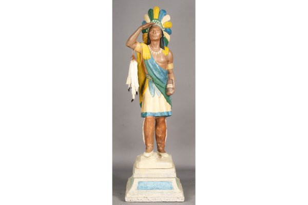 CAST PLASTER CIGAR STORE INDIAN STEPPED BASE: Cast plaster cigar store indian with overall paint decoration standing on stepped base. Ht: 72" Width: 21.5" Depth: 22" ***PLEASE NOTE: All property shall be paid for by the purchaser within five (5)