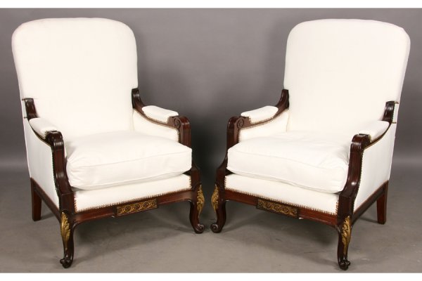 PR ANTIQUE FRENCH LARGE HIGH BACK BERGERES CHAIRS: Pair of antique French overscaled bronze mounted bergeres with high backs, loose cushion seats, scrolling arms and cabriole legs circa 1910. Ht: 44.5" Width: 29" Depth: 27" ***PLEASE NOTE: All propert