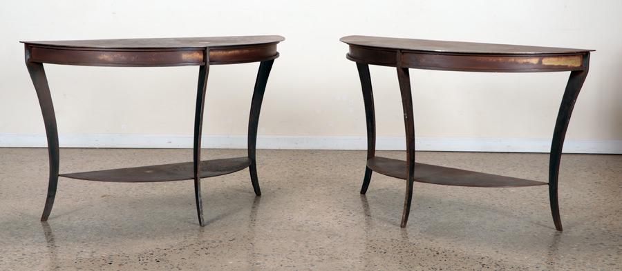 PAIR DEMILUNE FORM STEEL CONSOLE TABLES: A pair of demilune form steel console tables. Ht: 30" Wd: 48" Dpth: 20"