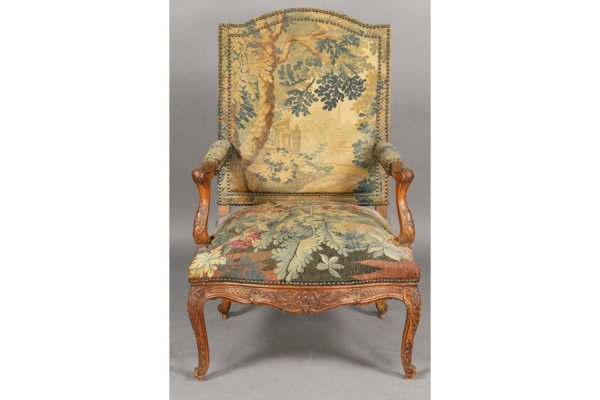 ANTIQUE FRENCH LOUIS XV STYLE WALNUT ARM CHAIR: Antique French Louis XV style carved walnut armchair with Aubusson upholstery, carved seat rail and cabriole legs circa 1870. Ht: 43.5" Width: 24" Depth: 24" ***PLEASE NOTE: All property shall be paid