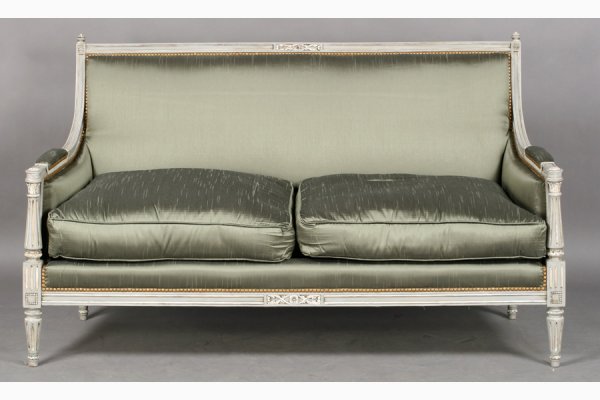 VINTAGE FRENCH LOUIS XVI STYLE CARVED CANAPE SOFA: French Louis XVI style carved, painted and upholstered canape, the arms with fluted columns and the legs being fluted and tapered circa 1940. Ht: 35.5" Width: 55" Depth: 23" ***PLEASE NOTE: All proper